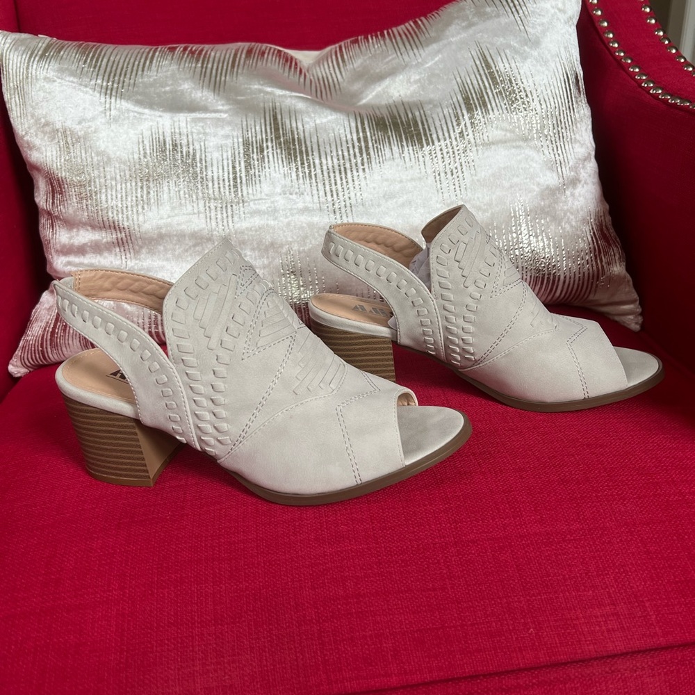 Peep toe slingback heeled booties